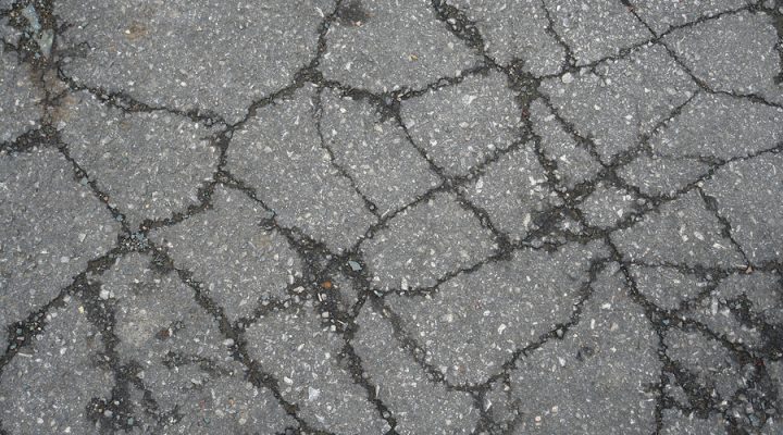 cracking asphalt pavement