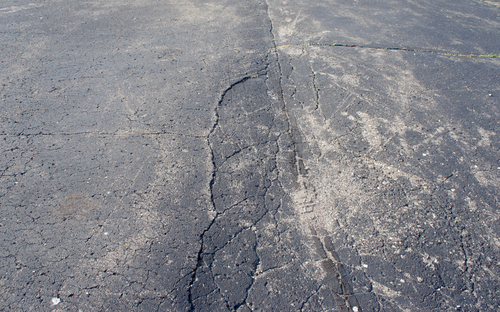 Does My Asphalt Need a Sealcoat, Overlay, or Reconstruction?