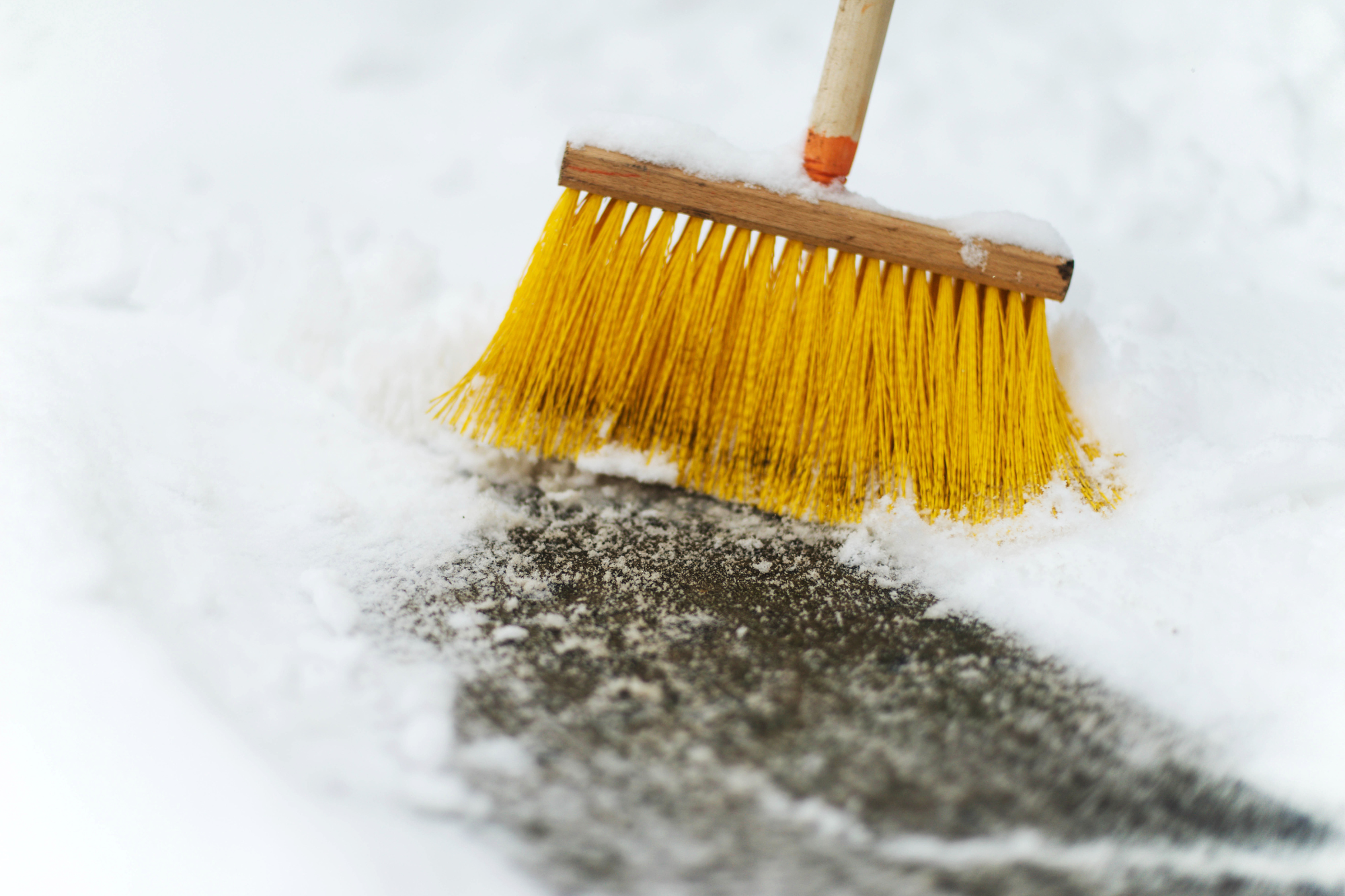How to Properly Sweep Snow From Your Commercial Pavement