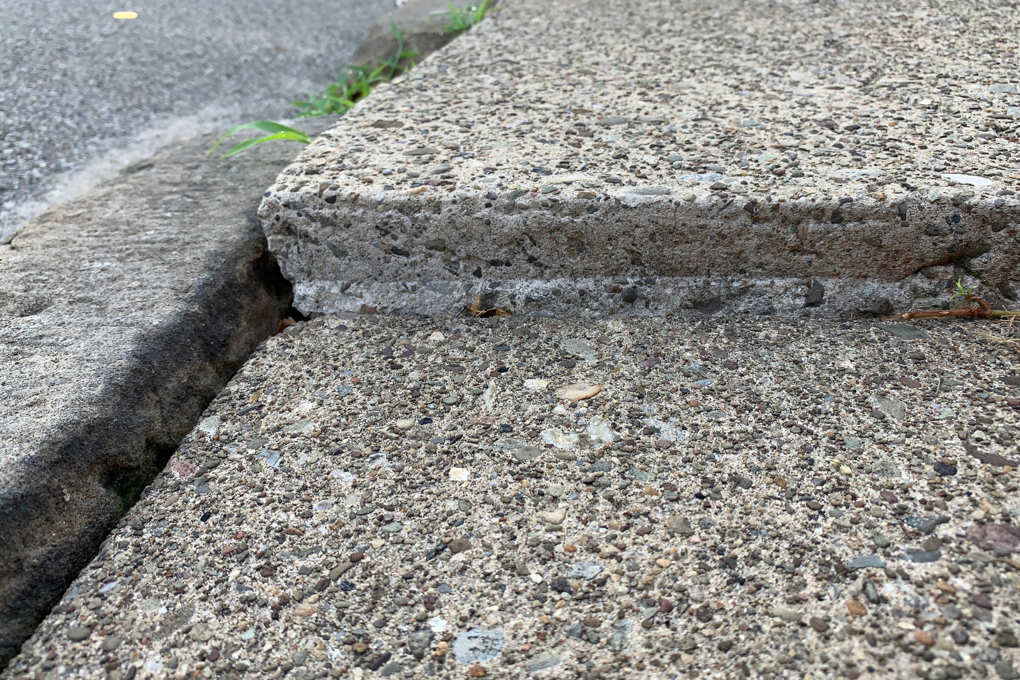 uneven sidewalk repair